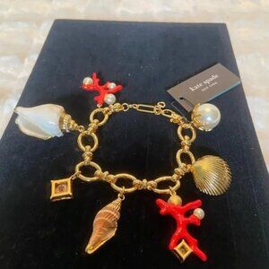 Kate Spade Gold Bracelet with Red and Pearl Charms